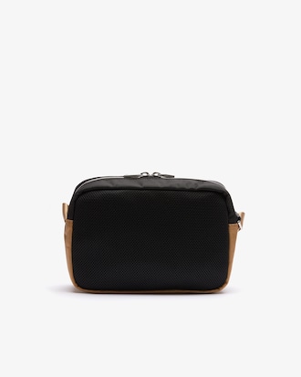 Sacoche L on the Go multipoches avec d&eacute;tails contrast&eacute;s