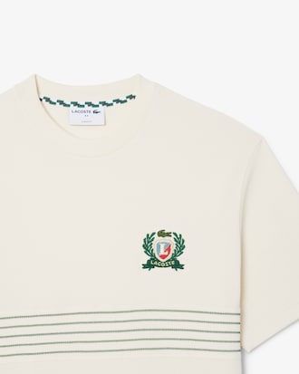 Playera de piqué con escudo bordado